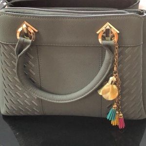 Ladies gray bag.